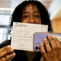 Asmayt Medhanie ’27 of Cambridge, Mass., poses with her message. Well-Being @ Bates presents: First Friday Notes Event date: Friday, Feb 2nd — 11:00-2:00 Location: Fireplace Lounge Stop by the Fireplace Lounge during lunch and join the Well-Being at Bates team in practicing gratitude by writing a postcard to someone you’re thankful for. Postage is on us — on or off-campus! For More Information Well-Being at Bates (Well-Being at Bates) (Well-Being at Bates (Well-Being at Bates)) healthservices@bates.edu 2077866199