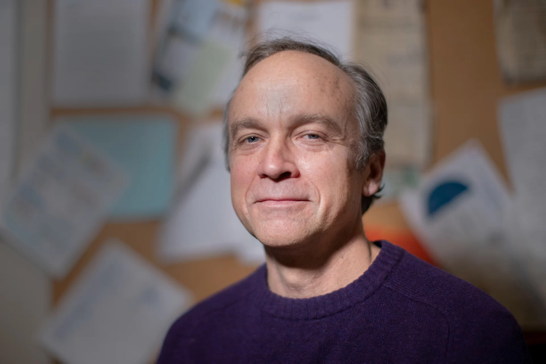 Robert B. Strong, Jr. poses in his Coram Hall office and outside of Coram where he parks his commuting bicycle.

Lecturer in English and Director of National Fellowships