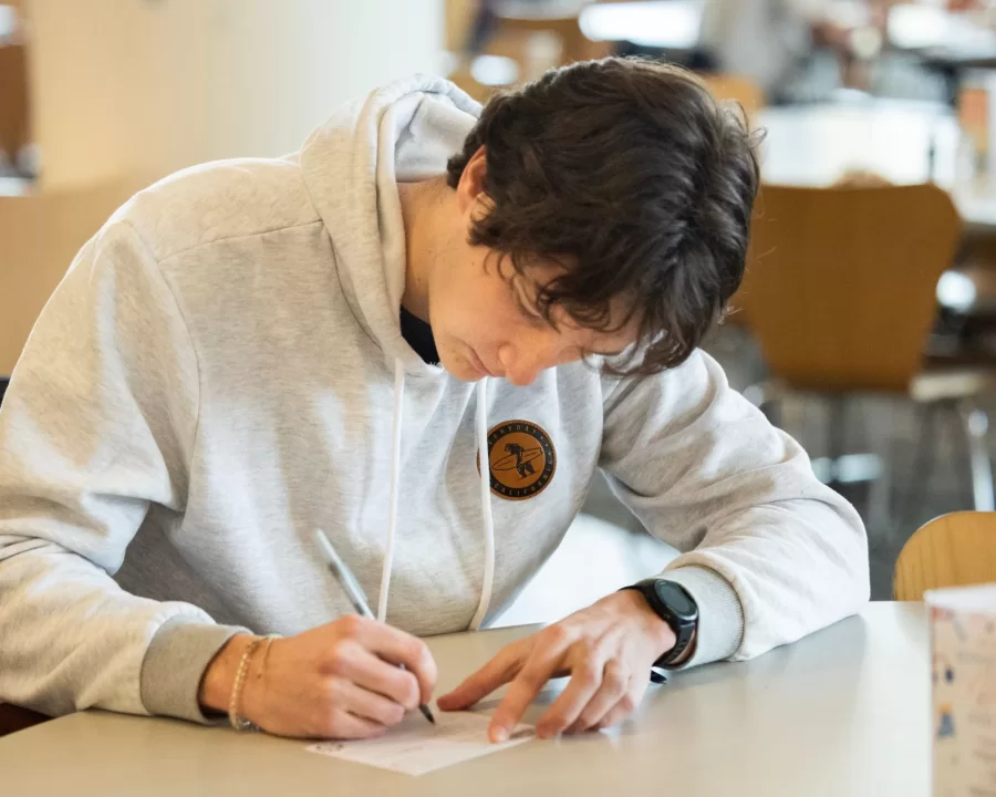 Jimmy Staller ’25 of Exeter, N.H., took the card with him to fill out in Commons as he grabbed lunch. (His message was to campus photographer, Phyllis)

Well-Being @ Bates presents: First Friday Notes
Event date: Friday, Feb 2nd — 11:00-2:00
Location: Fireplace Lounge


Stop by the Fireplace Lounge during lunch and join the Well-Being at Bates team in practicing gratitude by writing a postcard to someone you’re thankful for. Postage is on us — on or off-campus!
 
For More Information
Well-Being at Bates (Well-Being at Bates) (Well-Being at Bates (Well-Being at Bates))
healthservices@bates.edu
2077866199