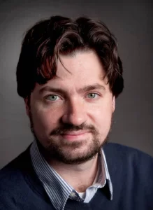 Associate Professor of Philosophy Paul Schofield is working on a book about the unique injustice of homelessness, an area of scholarship that stems back to volunteer work during the pandemic.