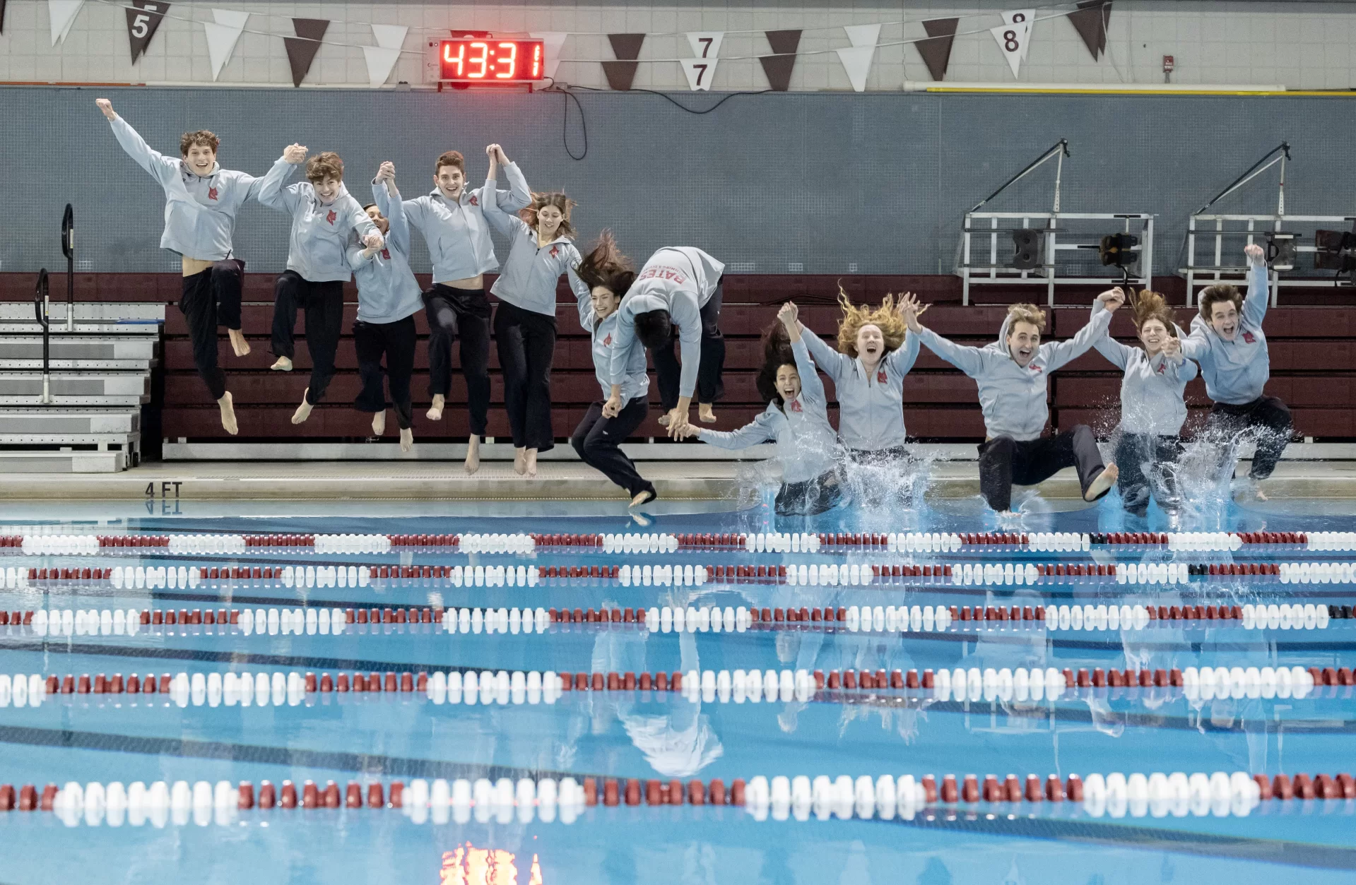 Twelve of thirteen Bates swimmers who are headed to NCAA Championships later in March pose for photos in Merrill’s Tarbell Pool on. March 4, 2023.

They 13 are as follows BUT Emily Kalvaitis was not able to attend the photo session, so only  12 appear in these images: Mark Gregory, Max Cory, Nate Pierce, John Weigel, Tim Johnson, Marrich Somridhivej, Grace Wenger, Sophie Cassily, Stephanie Tropper, Natalie Young, Emily Kalvaitis, Margie Mcleod, and Sarah Palmer.