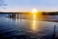 A cool Bates rowing ritual: putting out the docks, earlier than ever before