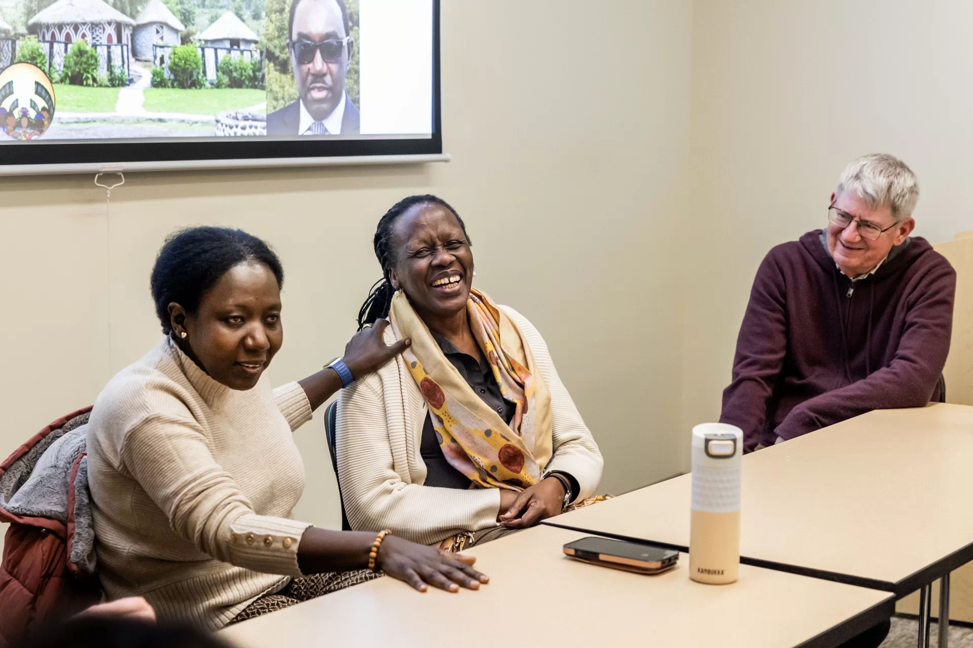 In Pettengill Hall, guests from “Rwanda 30 Years After: Trauma Healing of Genocide Survivors and Intergenerational Trauma,” who spoke at the Olin Arts Center on Sunday, March 24, meet in a join session Professor of Politics James Richter and his students in The Politics of Memory (PLTC 332 on March 26, 2024. Professor of French and Francophone Studies Alex Dauge-Roth introduces the guests, who are survivors of the Rwandan genocide, Esther Mujawayo (with scarf and black jacket) and Chantal Kayitesi (in turtleneck and orange jacket)


Organizer: Dept. of French and Francophone Studies, BatesCollege
Co-organizers: Rwandese Community Association of Maineand Ibuka-Maine
Co-sponsors: Dept. of History, Dept. of Politics, TheAfricana Club
 &The Harward Center for Community Partnerships