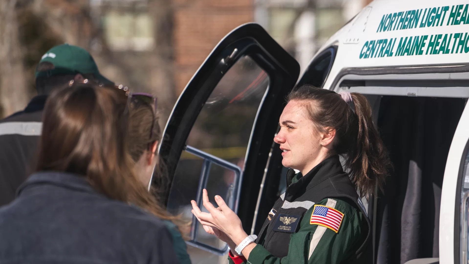 Jillian Sheltra '19 of LifeFlight gives tours of the helicopter after the Public Safety Awareness Helicopter Landing. Feb. 10, 2024.
