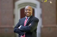 President Garry W. Jenkins poses for portraits adjacent to Alumni Gym, the Muskie Garden, and on the Historic Quad in front of Hathorn Hall.