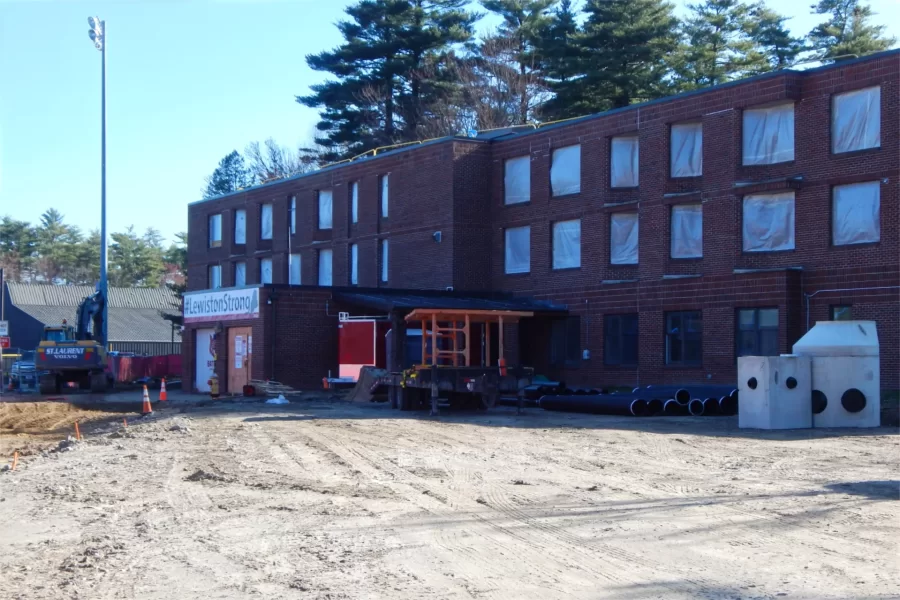 Pavement has been removed from the 96 Campus Ave. parking lot in preparation for utilities work and then a reconfiguring of the lot and surroundings. (Doug Hubley/Bates College)