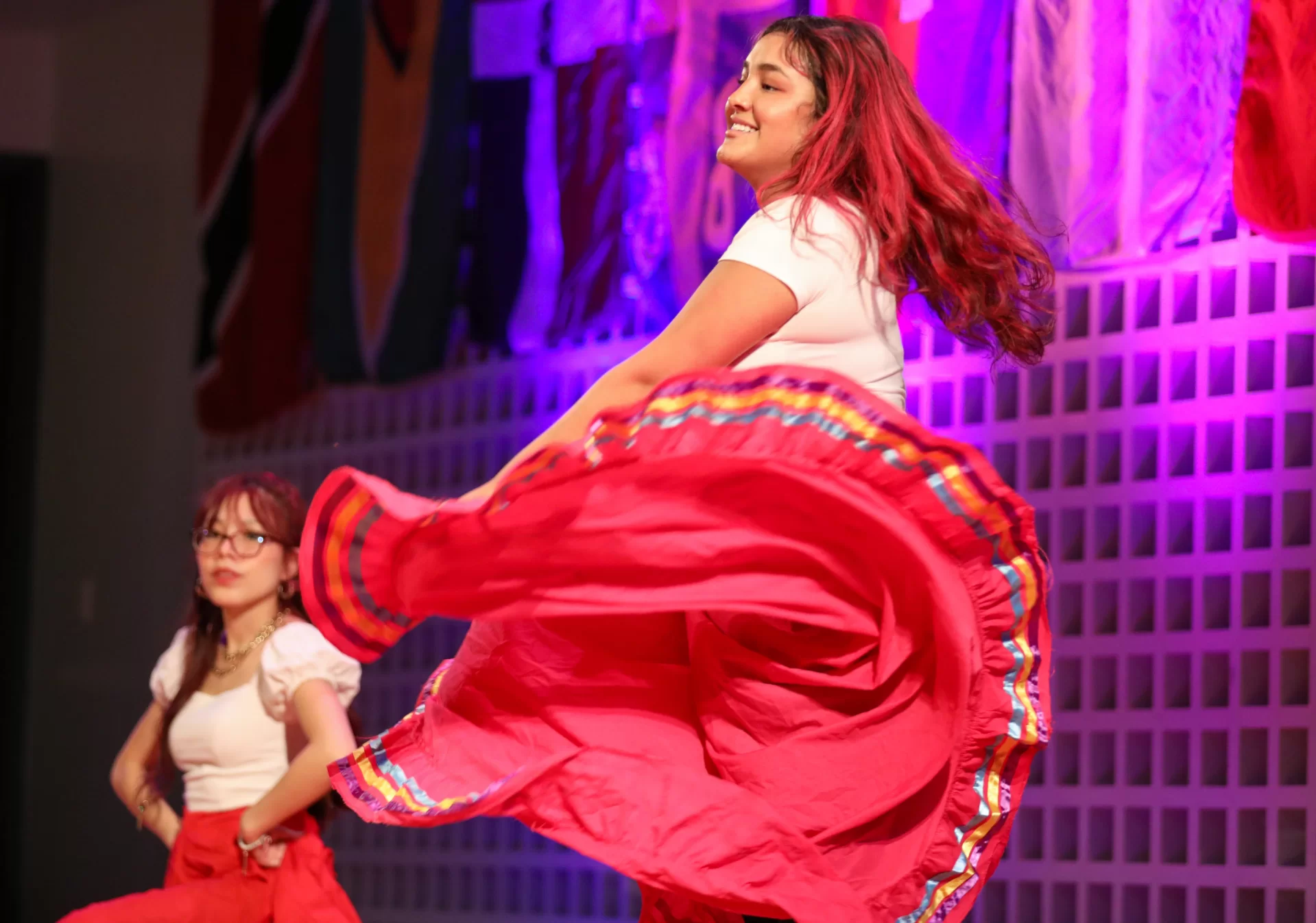 Cristina Salazar dances as part of her scene at the P'al Mundo cultural showcase,