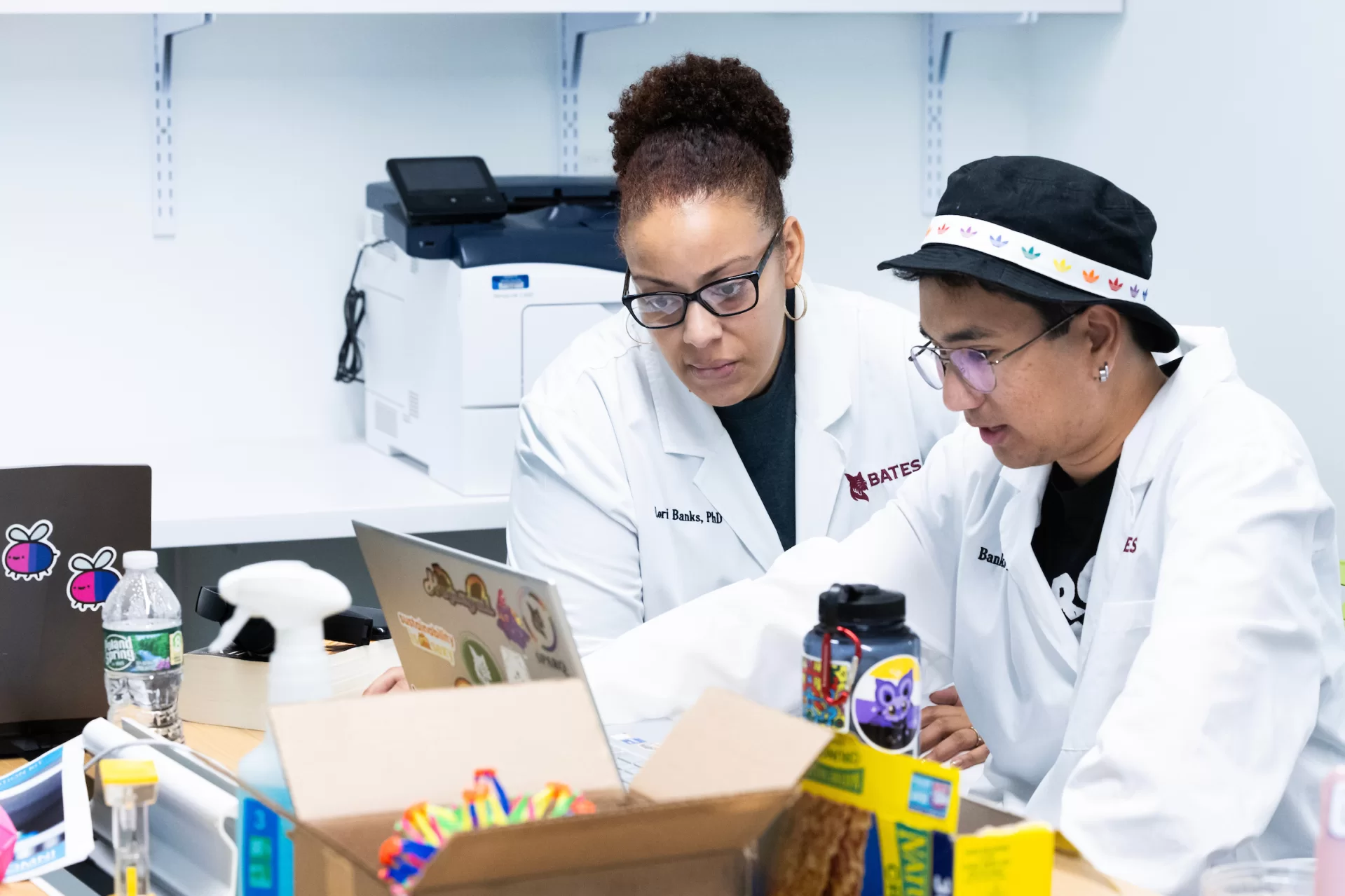 Assistant Professor of Biology works with a group of her summer research students in her Bonney Science Center lab on July 13, 2023.