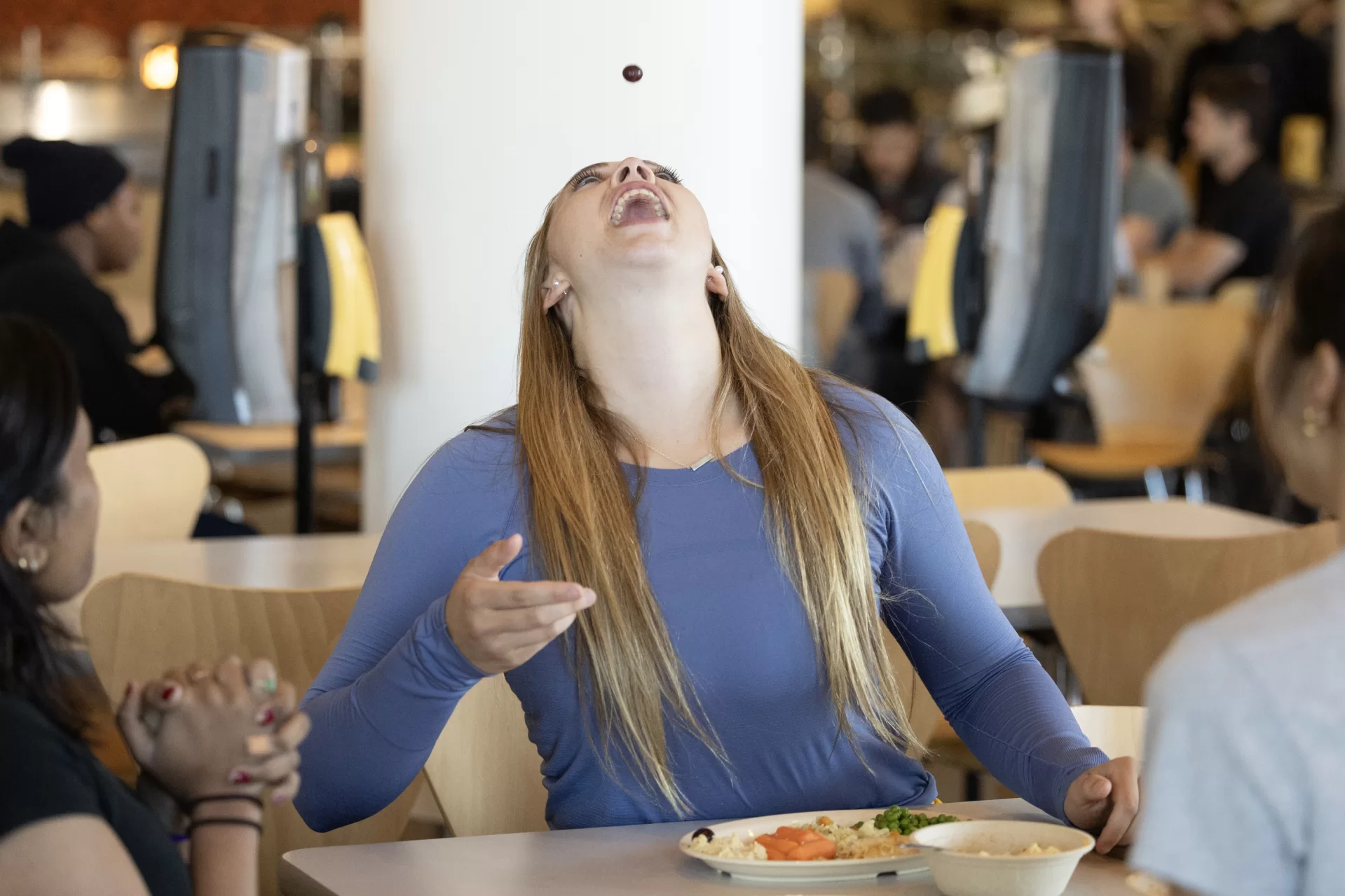 Grape tossing? Just another way to unwind.

Ask Livia Bernhardt ’24, a double major in biochemistry and mathematics from Leicester, Vt., who manages the challenges of exam week by making sure she “continues to lean on the support from my friends around campus.”

Whether it’s meeting in Commons with friends such as Nina Greeley ’24 of Scarborough, Maine, and Mallika Jena ’24 of Hong Kong for lunch or checking in with Commons Associate Ornella Nibasumba — someone she’s “bonded with over the past few years” — to compare notes on how their days are going, Bernhardt says she’s “sure to prioritize time with the people I’ve gotten to know over my time at Bates. Even though it may seem like grades and exams are heavily important at this moment in time, it really is the connections and friendships you make at Bates that you’ll remember in years to come.”

Bernhardt’s typical schedule at Bates includes “plenty of sleep and healthy eating, but during exam week I make sure to put my well-being at top priority.” When walking around Commons, she’s looking for foods from all the food groups, and that means  emphasizing plenty of vegetables. And fruit too, although she admits to a special fondness for grapes. 

And now grape tossing.

What do you do to take care of yourself? Move well, eat well, sleep well. 

And good luck with finals!