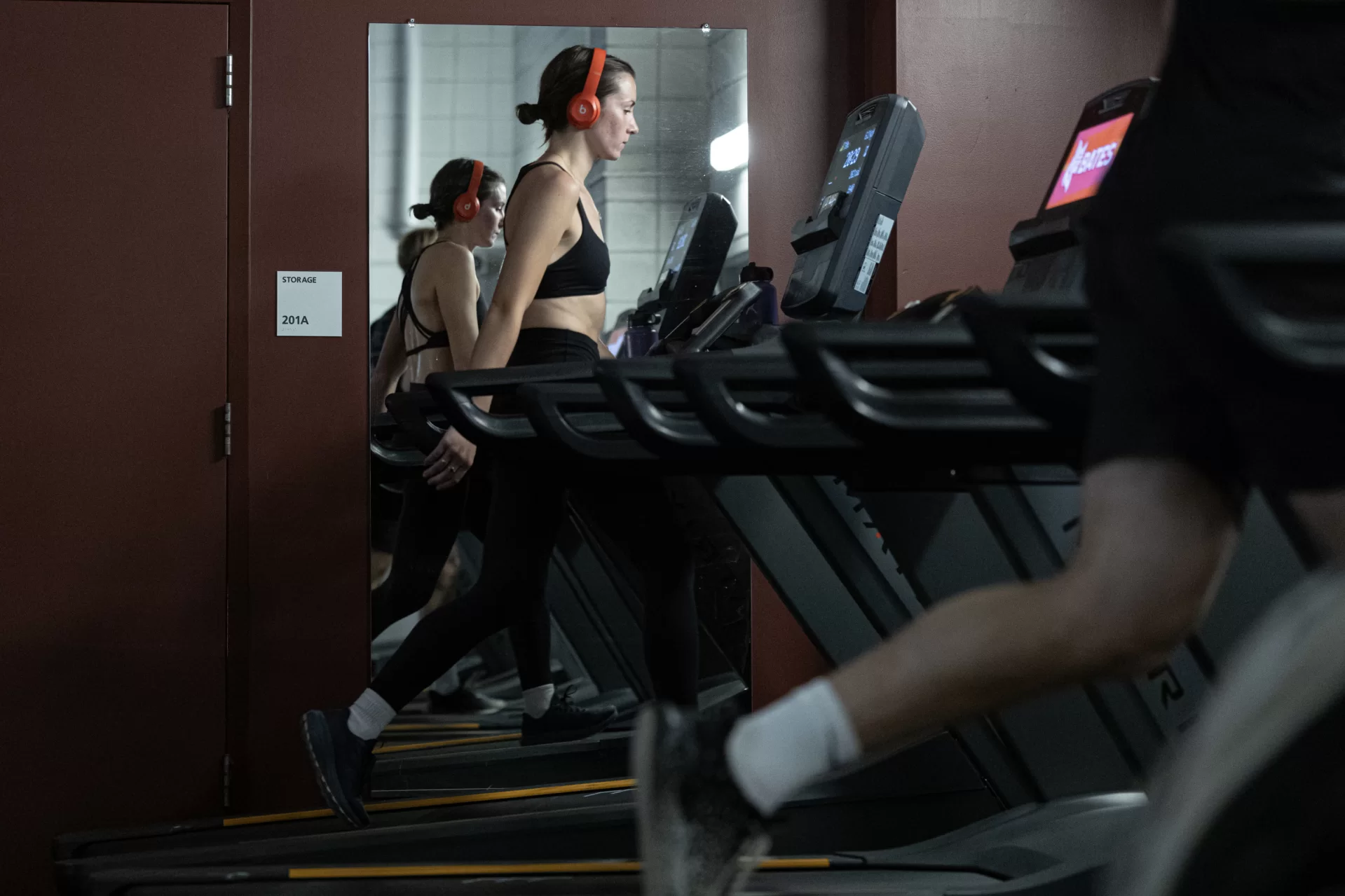 Student manager of Merilll Gym works out.