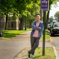 APPROVED, Alan Wang ’24 on College Street in front to Parker Hall where covered bus stop will be built on lawn behind him. 11/13/2023 16:25:54 Transportation for Bates awang3@bates.edu 5075817683 Student Better Bus Stop for Bates The MaineDOT is planning on implementing a commuter bus line between Lewiston and Portland. The bus line is set to terminate at Bates near Underhill Arena. However, the bus stop might not be pleasant and intuitive to use. Study from University of Minnesota show that bus stop amenities have a direct relationship with rider's perceived waiting time; having a bench can reduce the perceived waiting time by half compared to a stop without a bench. A well-equipped bus stop can entice more people to use it, thus reducing Bates' carbon footprint. "A bus shelter costs around $5,500. I want to apply for the full $2,000 grant to ultimately put this money back in the school's pocket, in the form of a well-designed bus shelter. This green fund can be a part of a larger funding package, I'm assuming that MaineDOT and the operator of this bus line will both pitch in to fund this shelter. The bus shelter should protect riders from weather elements, display proper signage and maps, equip with lighting and seating. MaineDOT also recommends installing bike racks and trash cans. The green grant can be used to achieve aspect(s) of the above objectives. " Increase comfort level when using public transportation. Reduce perceived waiting time. Encourage faculties and staff to commute using public transportation, thus reducing GHG emissions and free up parking spots.