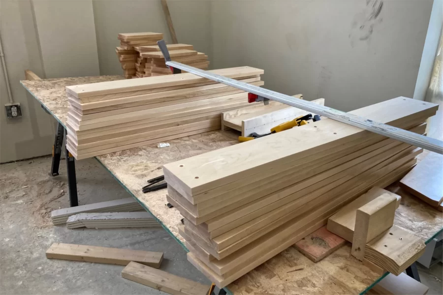 A future student room on the second floor, this space is serving as a work area for Windham Millwork. (Doug Hubley/Bates College)