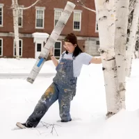 Sophie Hafter ’25 of Brooklyn, N.Y., crafts faux birch trees for upcoming performance of ‘The Seagull’ by Anton Chekov Serene but surreal: Sophie Hafter ’25 and the art of making theatrical magic How magic is made: Sophie Hafter ’25 crafts faux birch trees for upcoming performance of ‘The Seagull’ The magic touch: Sophie Hafter ’25 brings theater to life with scenic arts creations Shown in the set shop where she paints the paper that will be wrapped around cardboard to make birch trees for the Schaeffer Theatre stage; shown on Alumni Walk with her paper trees amidst the real birch trees; and then back in Schaeffer Theatre where she continues fashioning trees. Shown with Professor of French and Francophone Studies Kirk Read who performs in the play, and with director Joshua N Hsu. Konstantin is a young playwright struggling with his artistic identity and complicated relationship with his famous actor mother, Arkadina. Konstantin’s also in love with Nina, a naive aspiring actor, who’s also infatuated with the more successful writer Trigorin, Arkadina’s lover. Aspirations, family, and romantic entanglements inevitably collide, testing Konstantin and Nina’s sense of worth and purpose. Chekhov’s wry classic skillfully intertwines the ordinary with the poetic, illustrating the duality of human existence: an existence where our dreams give us the drive to move forward, but our decisions haunt us at every turn. “The Seagull” is a darkly comedic exploration of unfulfilled ambitions, unrequited love, and the bittersweet nature of artistic success. Content Warning This production includes strong sexual content, mental illness, self-harm, intentional self-injury, discussion of suicide, alcohol abuse, offstage gunshots, simulations of using tobacco, and a realistic-looking firearm prop.