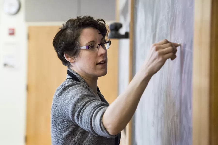 Associate professor of Philosophy Lauren Ashwell takes to the blackboard to illustrate concepts during a course entitled Logic: Possibility, Probability, and Proofs on Feb 17, 2016.
