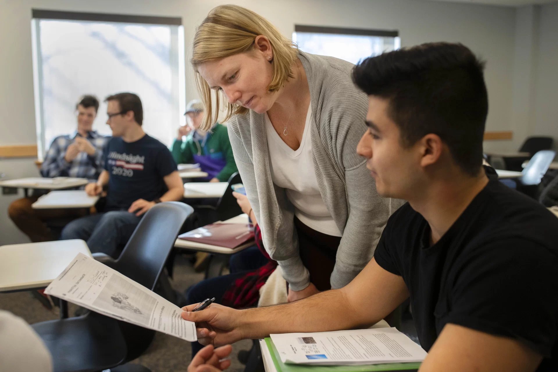 professor helping student with paper