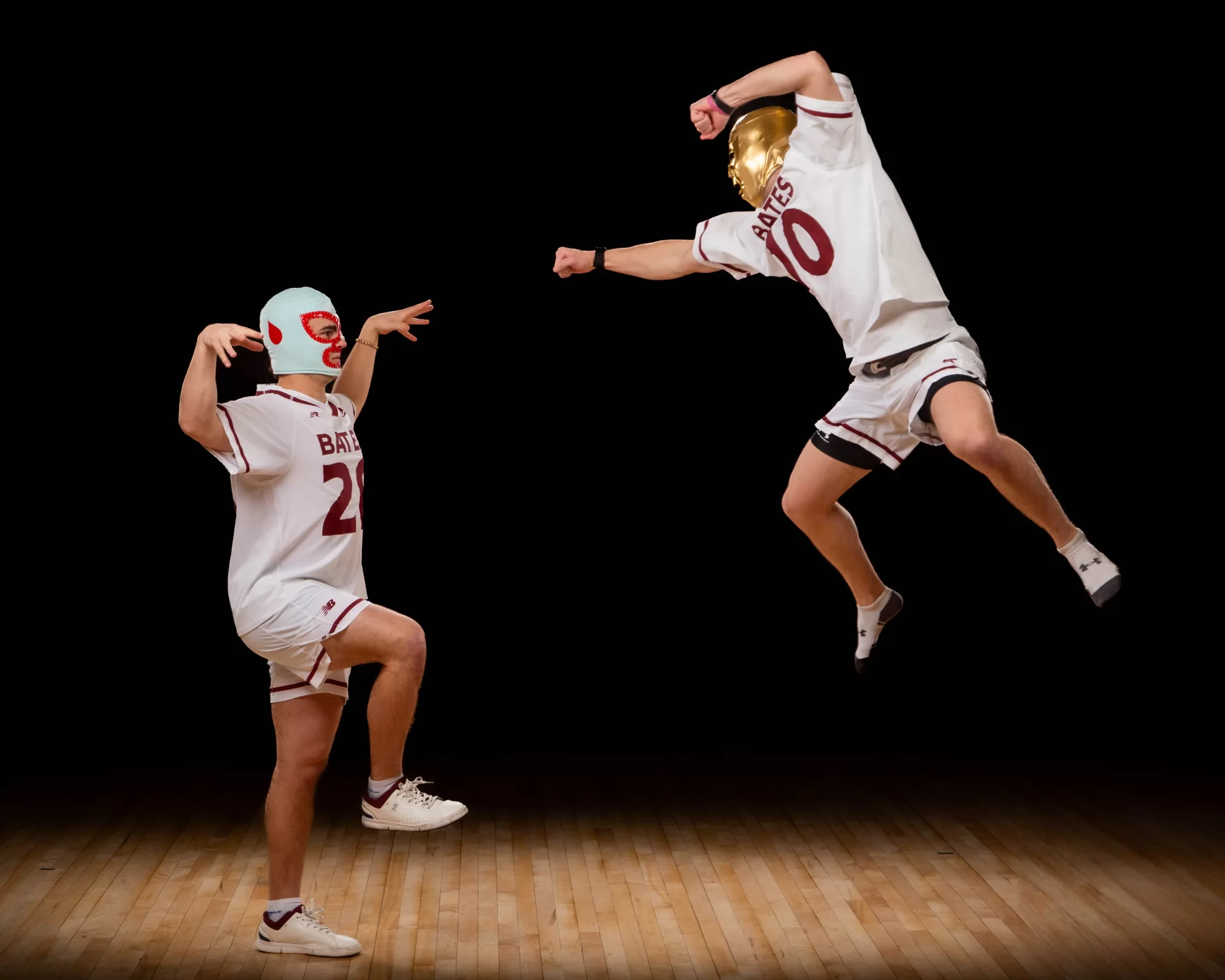 two lacross players dressed in Lucha libre masks