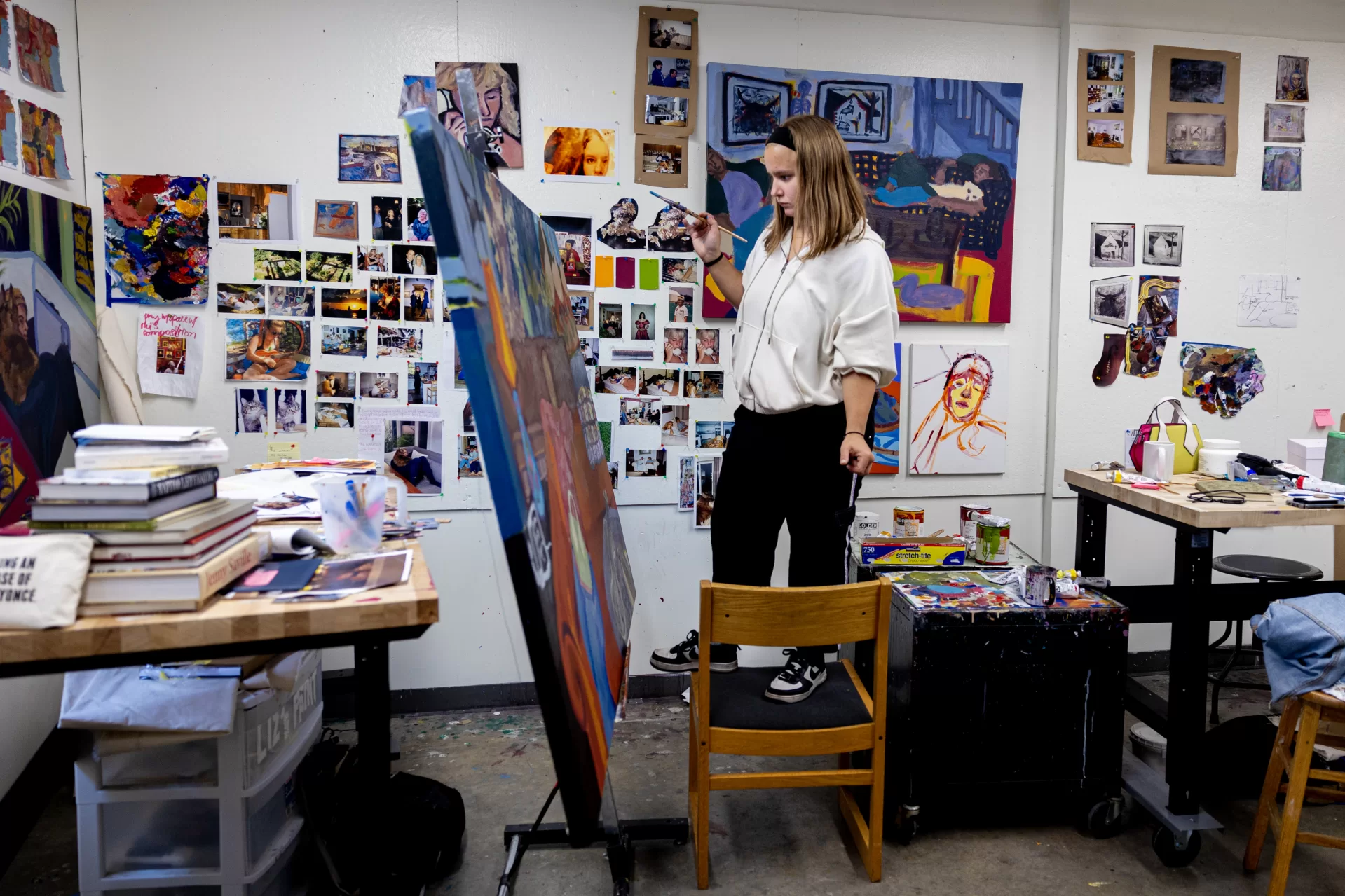 Taking place in the spring of each year, this exhibition highlights work selected from the thesis projects of graduating seniors in Studio Art. This year, seven emerging artists will present work in various media:
Elizabeth Barrow in her Olin studio with her work
Elizabeth R. Barrow
Miryam Keller
Avery Lehman
Erin McCarthy
Alex Provasnik
Lila Schaefer
Danny J. Zuniga Zarat
Thesis projects vary from student to student, each pursuing an individual interest. The emphasis of the program is on creating a cohesive body of related works through sustained studio practice and critical inquiry. The year-long process is overseen by Art & Visual Culture (AVC) faculty, and culminates in this exhibition. The Bates College Museum of Art maintains a close relationship with the college’s AVC department, and is committed to supporting the work of Bates students through this Annual Senior Thesis Exhibition.
To see more about the artists’ work, visit the website: https://www.bates.edu/museum/exhibitions/senior-thesis-exhibition-2025/