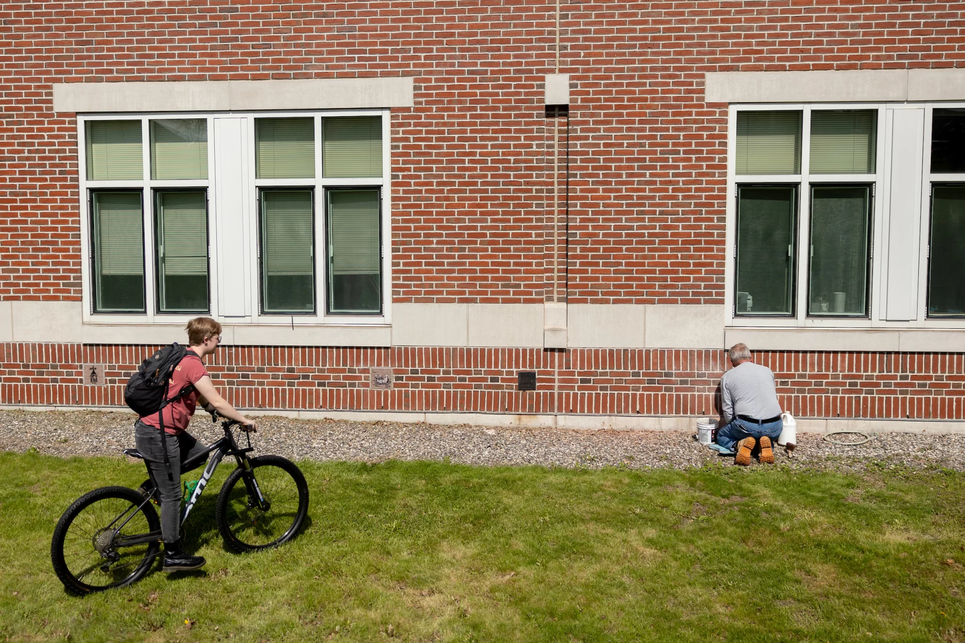 student arrives by bike