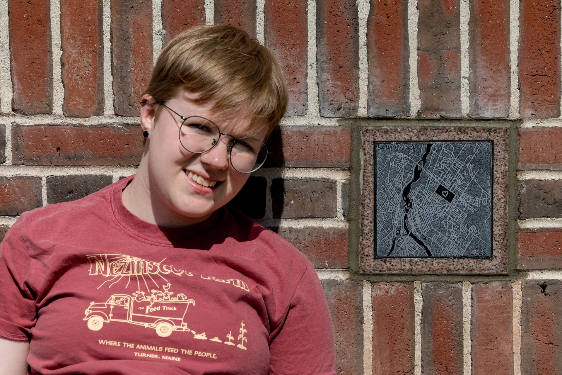 Student posing with Ivy stone