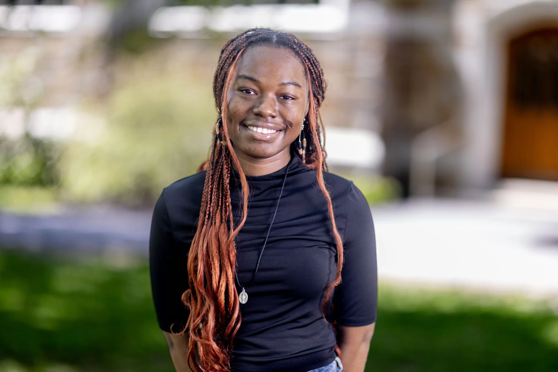 Axelle Tougouma ’27 posing for a portrait.