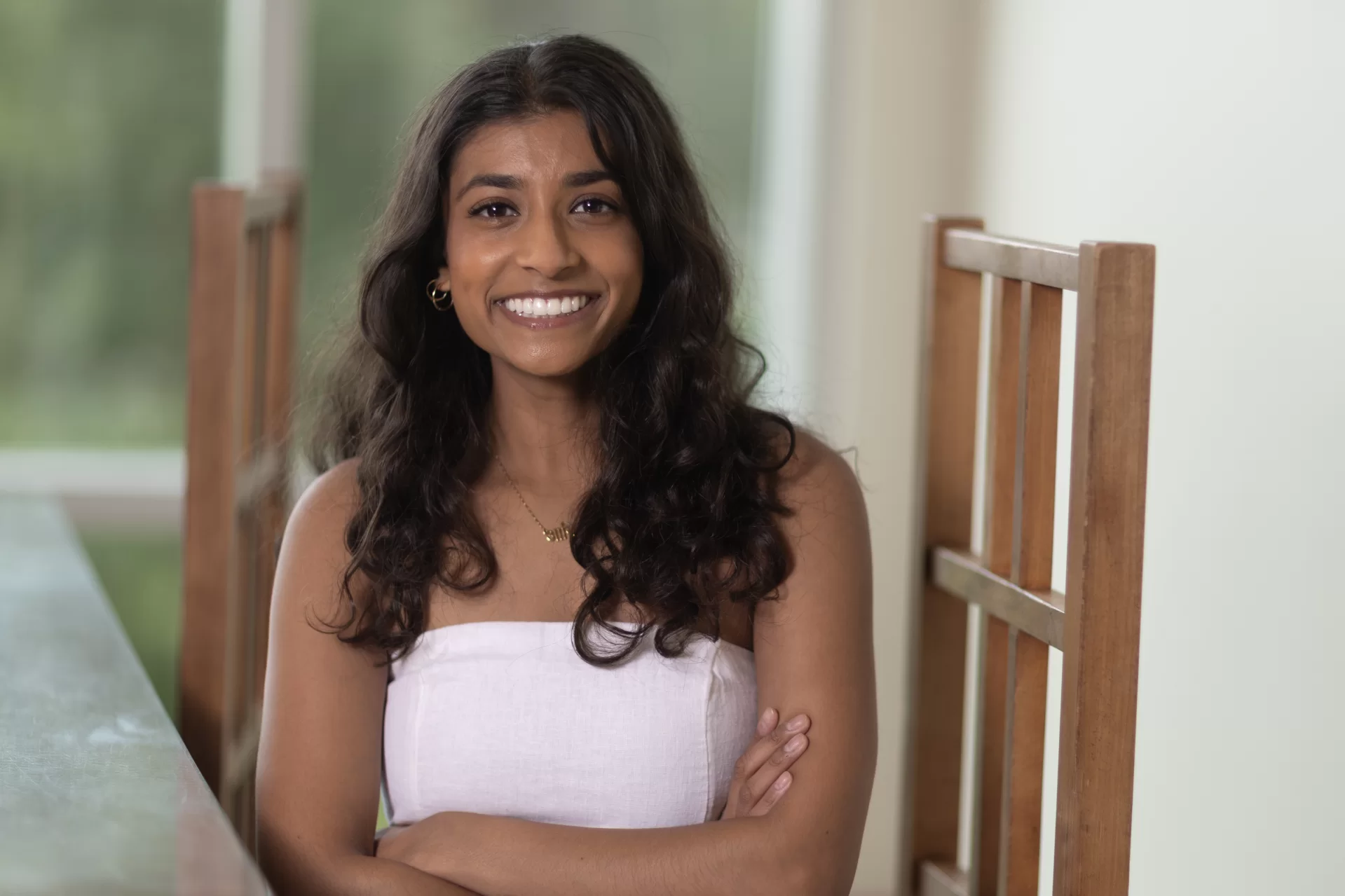 When Aanika Patel ’25 of Needham, Mass., will offer this year’s Senior Address at Commencement. On a rainy day, she poses for a portrait in Pettengill’s Perry Atrium.