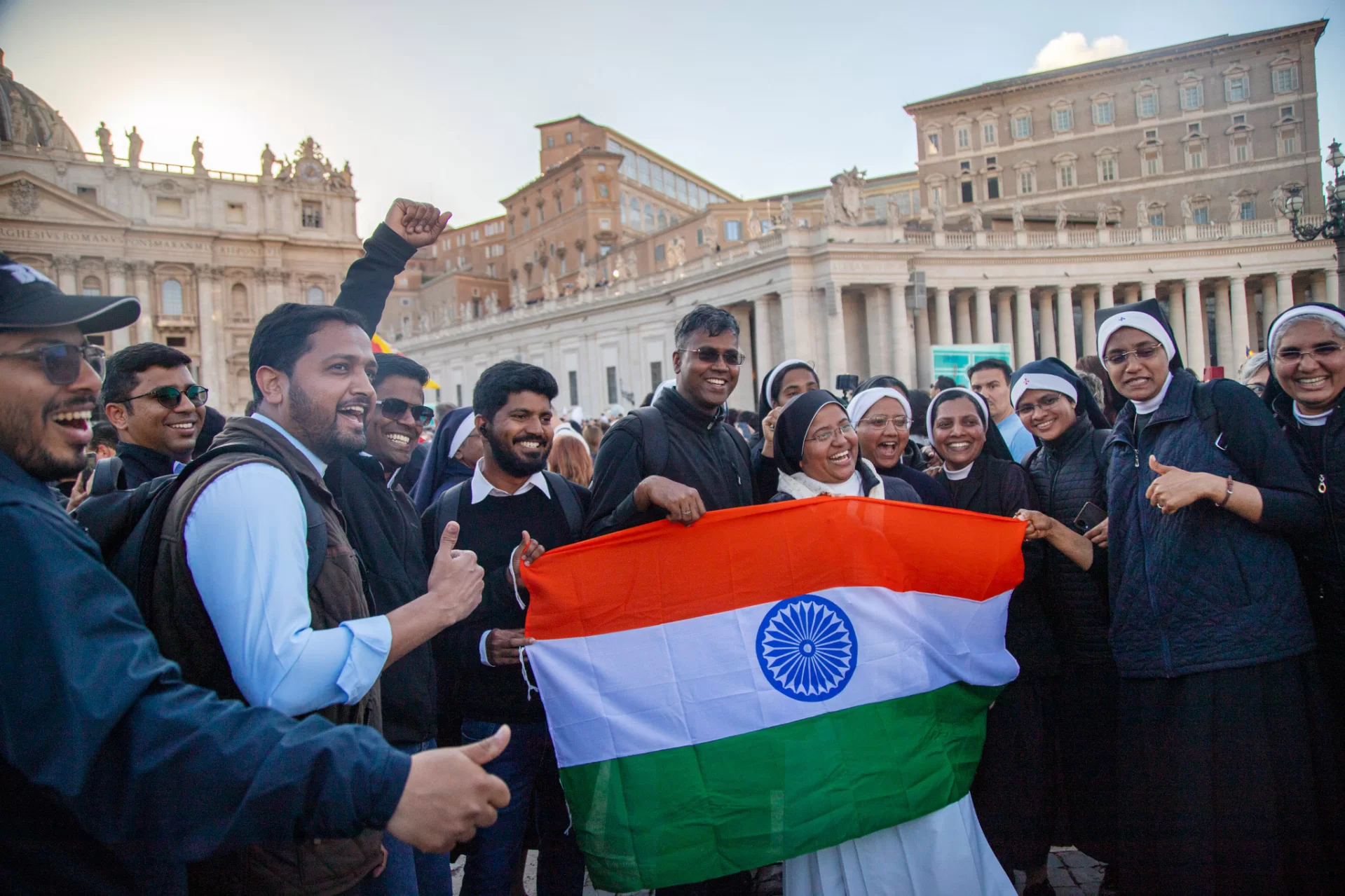 : St. Peter's Square became a worldly place during the conclave, including this group from India. (Photograph by Carly Philpott '27