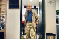 97-year-old Ralph Sylvester, Bates Class of 1950, arrives at the Bobcat Den on Aug. 17, 2021, where he renewed a morning routine, having breakfast with Alan Kelley of Facility Services in the Bobcat Den, which reopened today at 8 a.m. after being closed since March 20, 2020, due to the pandemic. “The Den is where Ralph and I became friends,” said Kelley, who is the mechanical and electrical services manager for Facility Services. “You can see a lot of people come through the Den who you might not see on a regular basis on campus," Kelley added. "It’s great to say hi, how you doing, and fill your belly with a good meal to start your day.”