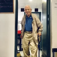 97-year-old Ralph Sylvester, Bates Class of 1950, arrives at the Bobcat Den on Aug. 17, 2021, where he renewed a morning routine, having breakfast with Alan Kelley of Facility Services in the Bobcat Den, which reopened today at 8 a.m. after being closed since March 20, 2020, due to the pandemic. “The Den is where Ralph and I became friends,” said Kelley, who is the mechanical and electrical services manager for Facility Services. “You can see a lot of people come through the Den who you might not see on a regular basis on campus," Kelley added. "It’s great to say hi, how you doing, and fill your belly with a good meal to start your day.”