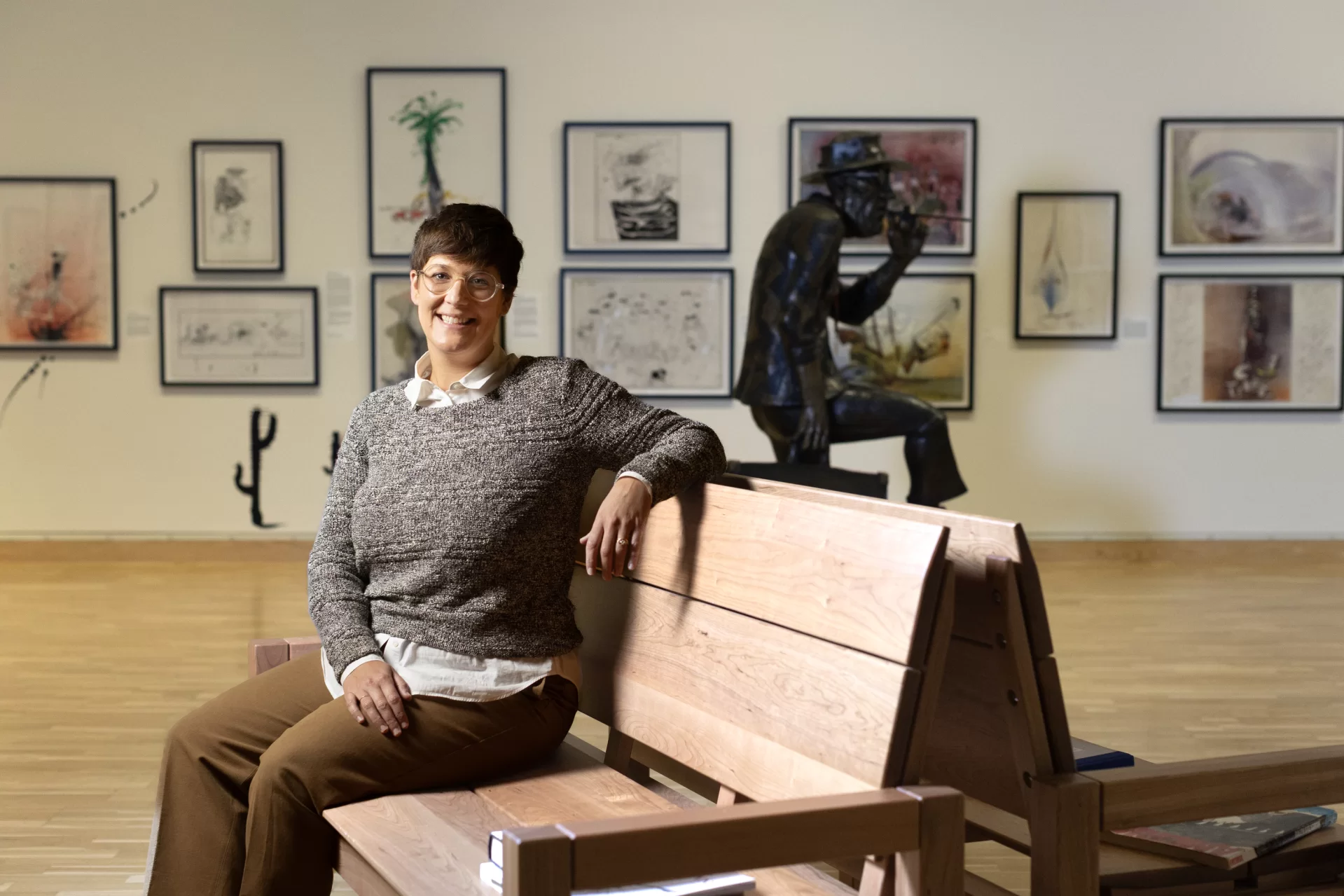 Carrie Cushman, who joined Bates in August as the first new director of the museum since 2010, at the museum's current major exhibition, Ralph Steadman: And Another Thing, which is on display through October 11, 2025. Photo by Phyllis Graber Jensen