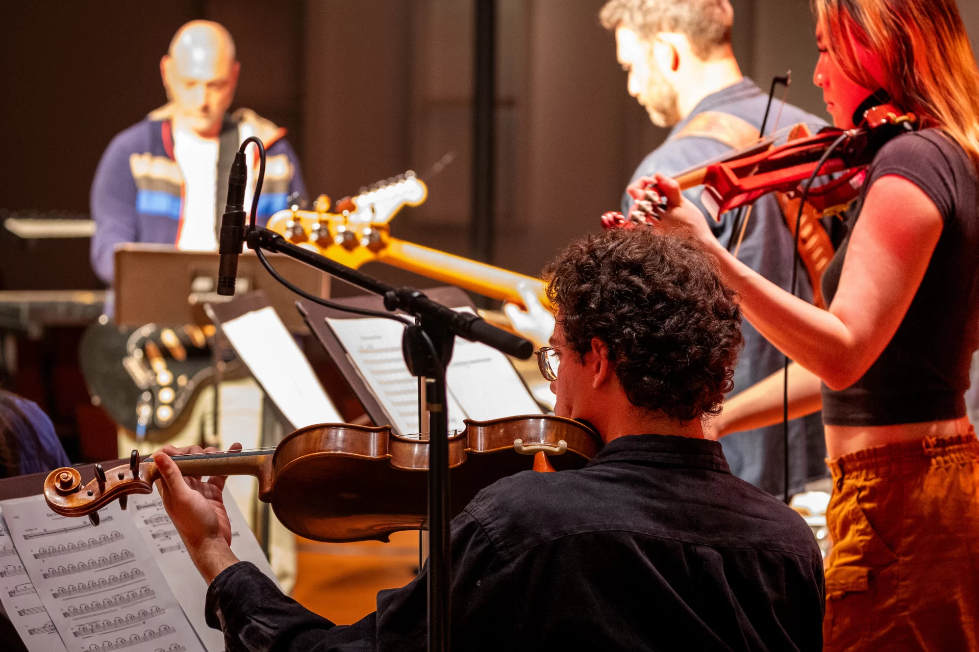 Students perform alongside a Radio Head tribute group in the Olin arts center during the weekend of october 25, 2025 both before and during the concert which Lewiston community members were invited to,