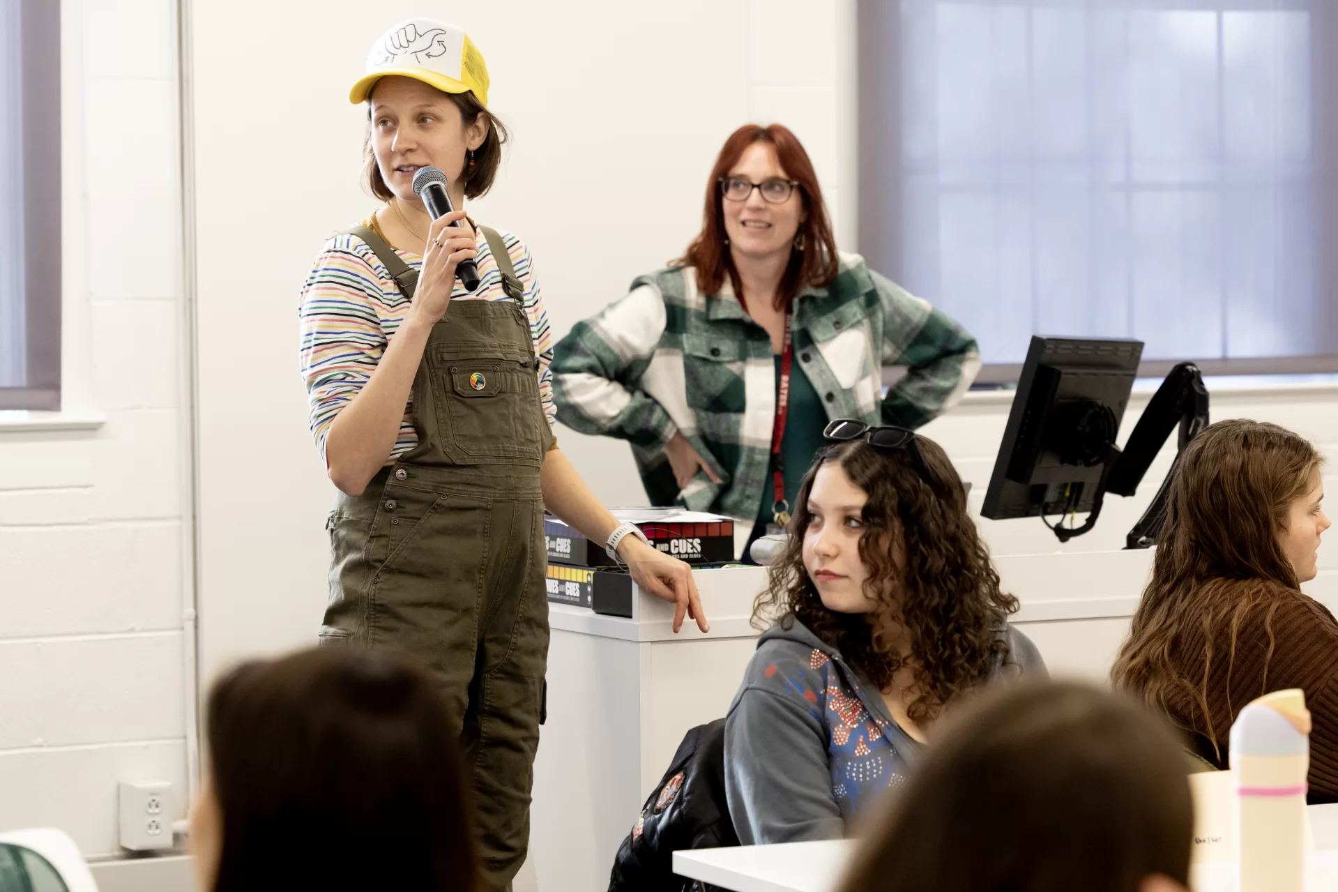 Two first-year seminar classes join together for a dynamic, interdisciplinary final class session During the last week of courses for the fall semester, two instructors, two classes, and one rabbit gathered together for an interdisciplinary, interactive first-year seminar class session. It was easy to tell who was from which course. Students from “Beyond the Rainbow: Exploring the Language (and the Science, Art, and Culture) of Color” had all walked in sporting colorful hats. Joining them in a classroom in Dana Hall were students from “Sex in the Brain: The Neuroscience of Sex, Gender, and Hormones.” While it is typical for students to grow close in these small — 16 students maximum — seminars, this merging of the courses for a class session was a new idea, meant to create new connections between both the subjects and students as the semester came to a close. Lindsey Hamilton ’05, director of the Center for Inclusive Teaching and Learning, and Wells Castonguay, the center’s assistant director, devised the plan. Castonguay was teaching “Beyond the Rainbow” and Hamilton “Sex in the Brain.” Throughout the semester, each professor had heard students’ ongoing curiosity about the other’s course and saw an opportunity for the students to learn from each other.