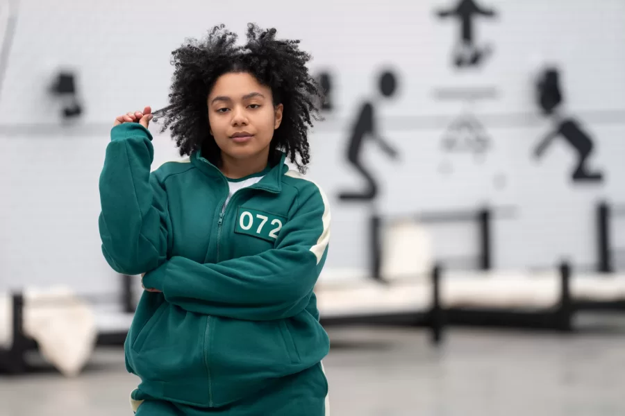 Squid Game: The Challenge. Perla Figuereo in season 2 of Squid Game: The Challenge. Cr. Pete Dadds/Netflix © 2025