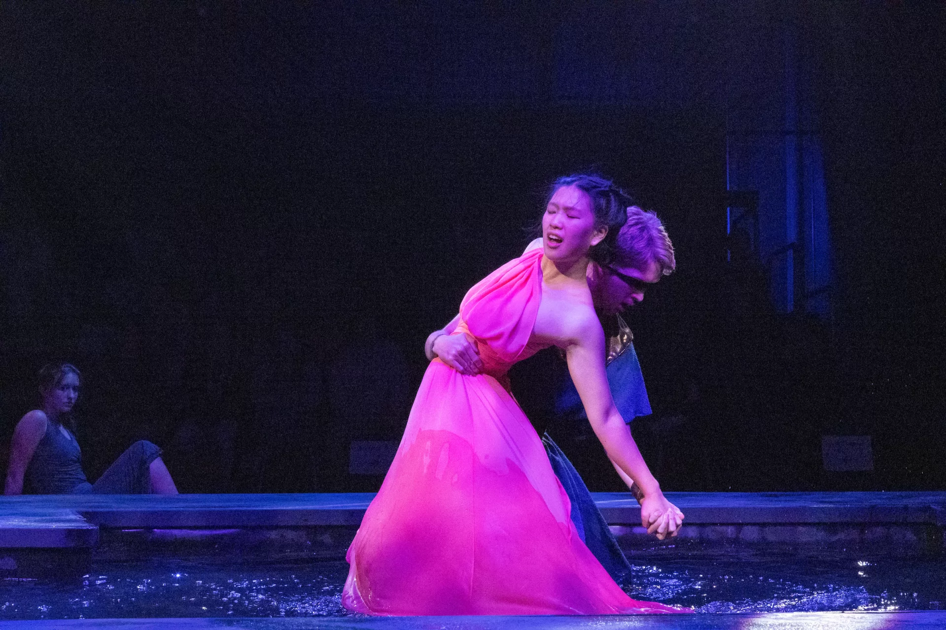 Jenny Liu ’29 of Suzhou, China, in the role of Myrrha, daughter of King Cinyras (Jack Hagan ’27 of Cape Elizabeth, Maine). Aphrodite curses Myrrha, forcing her to fall in love with her father and, with the help of her nursemaid, tricks him into an incestuous relationship with her. (Sammy Weidenthal ’27 for Bates College)