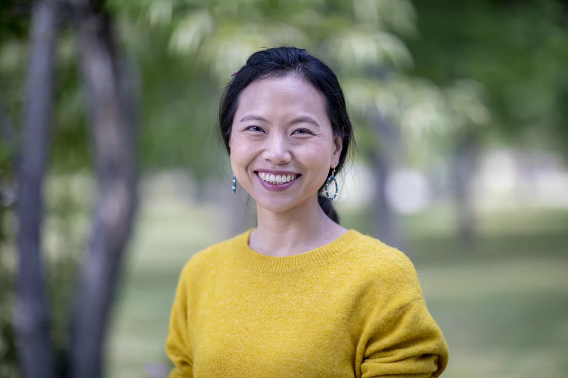 Assistant Professor of PsychologyYunkyoung "Yun" Garrison poses for a portrait on the edge of the Bates campus across from Lindholm House on Campus Avenue on Sept. 10, 2020