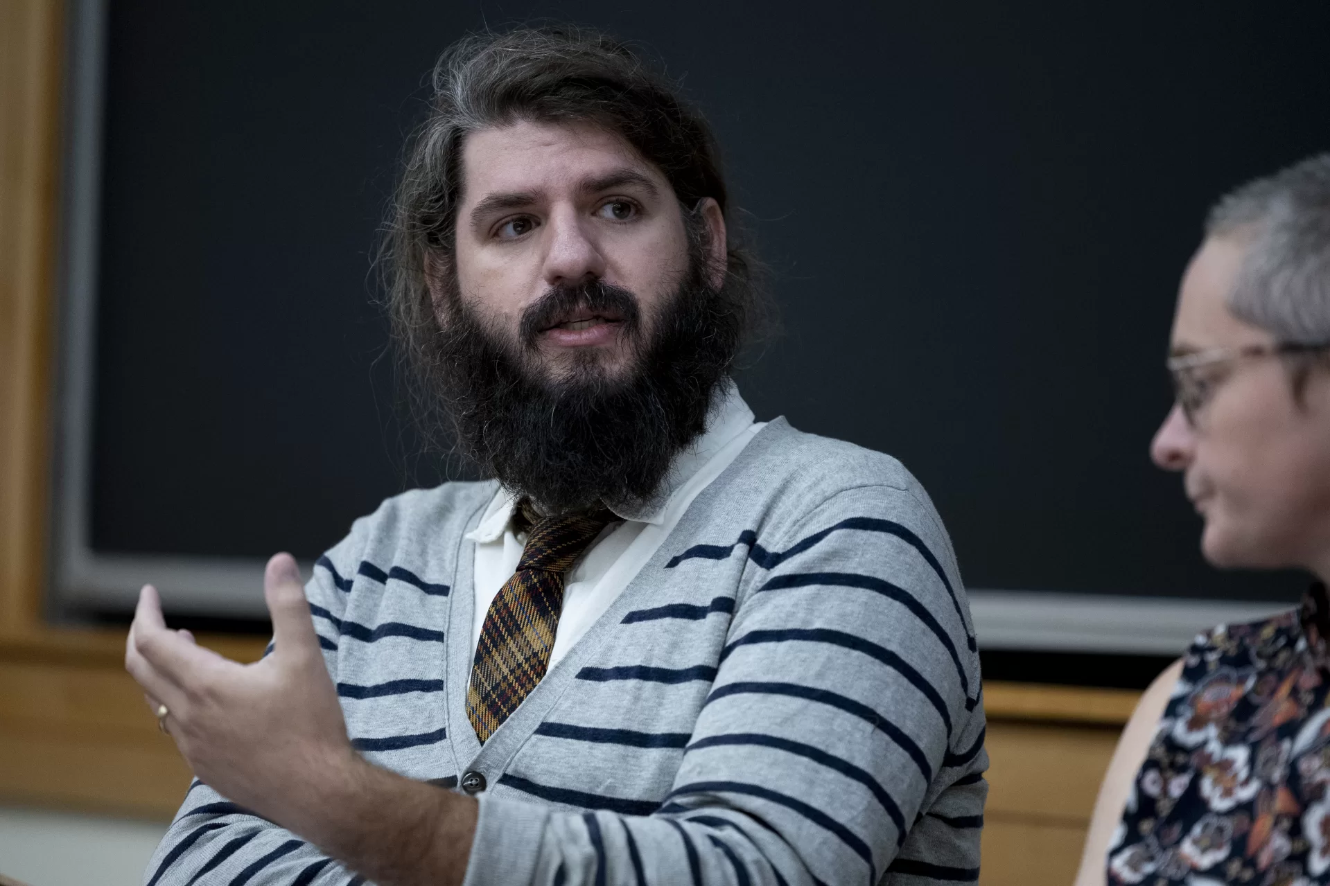 Join Professor Houchins and panelists Professor Lori Banks, Professor Alison Melnick Dyer, Professor Anelise Shrout, and Professor Mark Tizzoni on Monday, September 19 @ 12:00 in Pettengill G21. The panel will be moderated by Professor Charles Nero, Rhetoric, Film, and Screen Studies. Bag lunches will be available for take-away after the panel. Please register by Wednesday, September 14, 2022.
Making one's class uncomfortable—causing students to squirm when discussion excavates some of their repressed assumptions—is impolite, at the least—or even more, downright transgressive. These are occasions that demand extraordinary courage.
How do we engage with the issues of race, white supremacy, and unequal structures of power, when we face the possibility of backlash from unreceptive students? Are our class objectives flexible enough to accommodate such topics and still accomplish promised pedagogical goals? Will students who do not see the relevance of issues of race to their intellectual enterprise complain about the perceived detour in their course of study?
Many students feel vulnerable when discussing topics of race, even in Africana classes, where such discourses are central to the project. Why should their instructors be any more confident than they? Perhaps our exploring where discourses of race and social power are exposed, as well as occluded, in the foundational principles of our disciplines will provide us with new knowledge to shape curricula that will provide places to engage these dangerous topics.