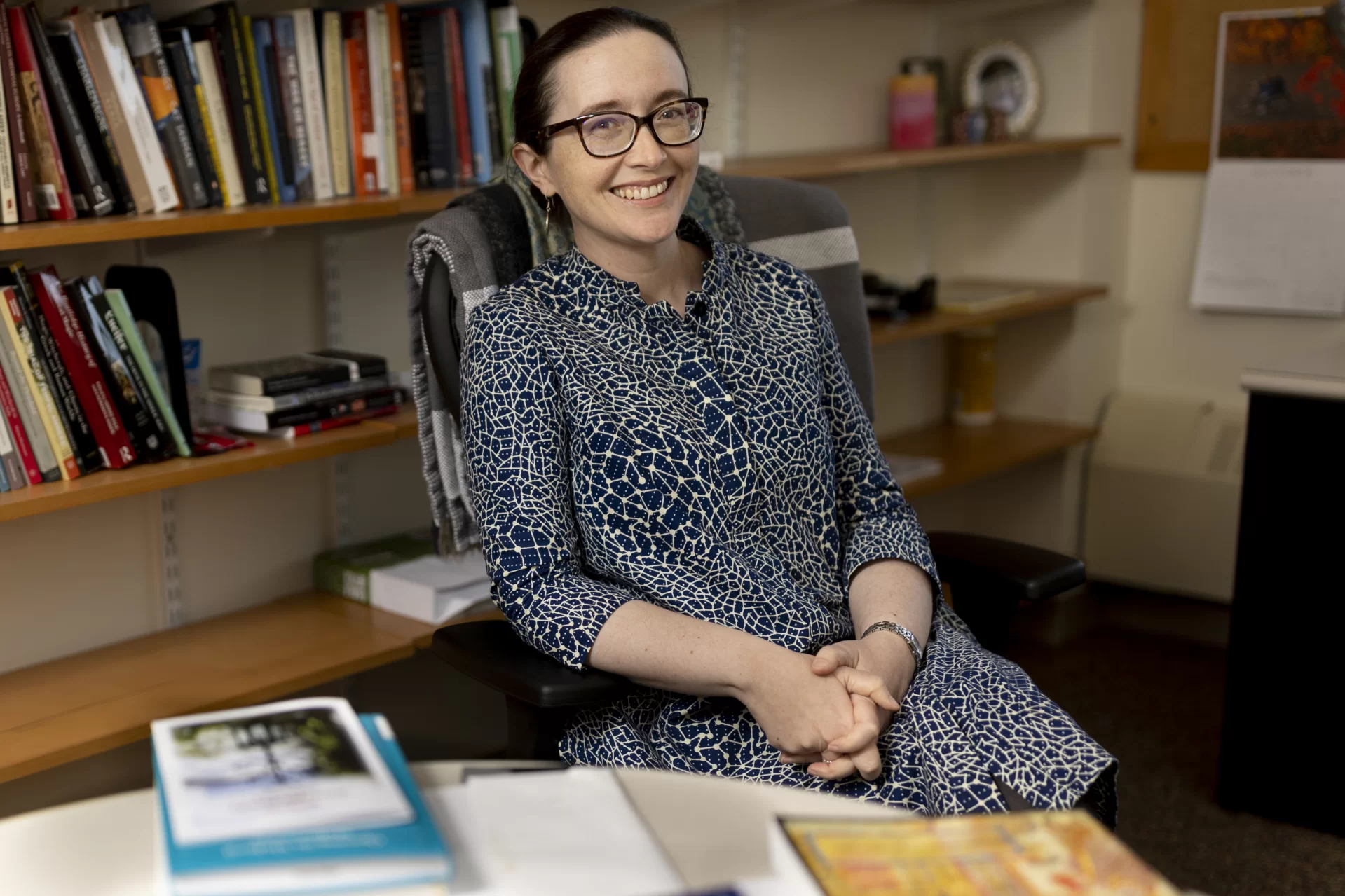 Assistant Professor of Classical and Medieval Studies Sarah Lynch, poses in her Pettengill Hall Room 102 office.