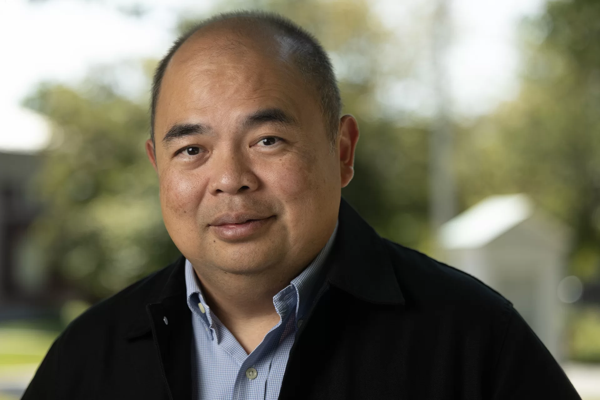 Assistant Professor of Economics poses for a portrait on the Historic Quad on Sept. 11, 2025.