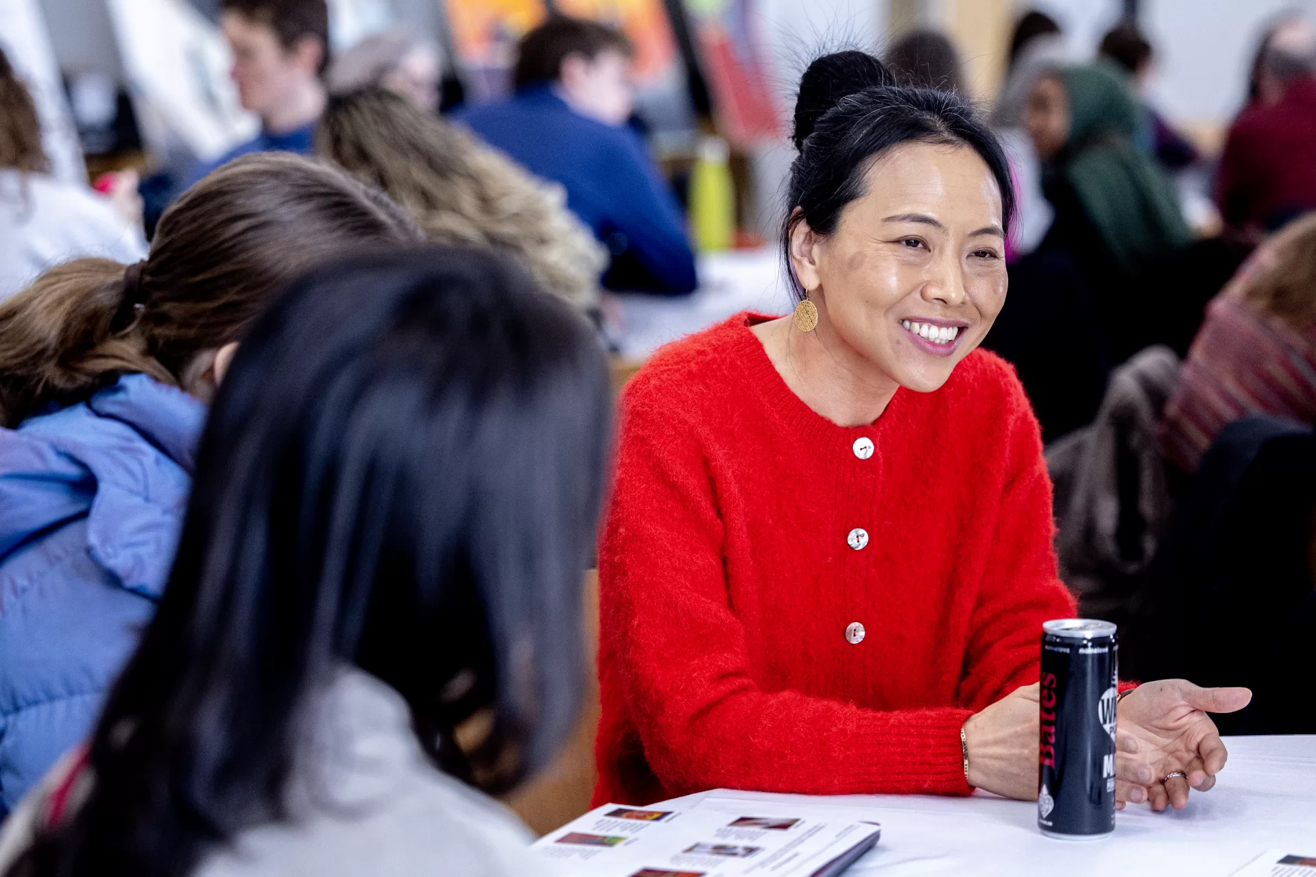 Yun Garrison, assistant professor of psychology, leads students in breakout session.
From Silencing to Empowerment: Exploring Anger, Justice, and Post-traumatic Growth Among Refugee Women and Women of Color
This workshop explores how anger — often silenced, stigmatized, or misinterpreted in the lives of refugee women and women of color — can become a transformative force for healing and justice. Many who experience trauma, violence, and displacement learn to suppress emotional expression to survive, protect others, or conform to systems that reward quiet endurance. Yet unacknowledged anger often becomes internalized as shame or self-blame. From Silencing to Empowerment reframes anger as a powerful signal of violated dignity and a catalyst for post-traumatic growth and collective empowerment.
Guided by the Ka Bogso (“Be Healed”) trauma-healing framework — co-developed by Lewiston-based refugee community leader Fowsia Musse and Bates Assistant Professor of Psychology Yun Garrison — this workshop integrates the 5Rs of healing within the post-traumatic growth model to chart a path from pain to purpose: (a) Running (recognizing self-silencing as a survival strategy), (b) Resettlement (noticing how anger can show up in different forms, such as anxiety, fear, or uncertainty when safety and belonging feel disrupted), (c) Residual Stagnation (identifying the invisible burdens of suppressed emotion), (d) Reconciliation (allowing anger to meet compassion and community validation), and (e) Resolution (transforming emotional pain into agency, justice, and renewed connection).
Through storytelling, art-based reflection, and small-group dialogue, participants will explore how anger can coexist with compassion and vision, moving from silence and isolation to voice and community. Ultimately, From Silencing to Empowerment bridges the Ka Bogso 5Rs and the theme of Love, Anger, and the Struggle for Justice, honoring anger not as destructive, but as a source of connecti