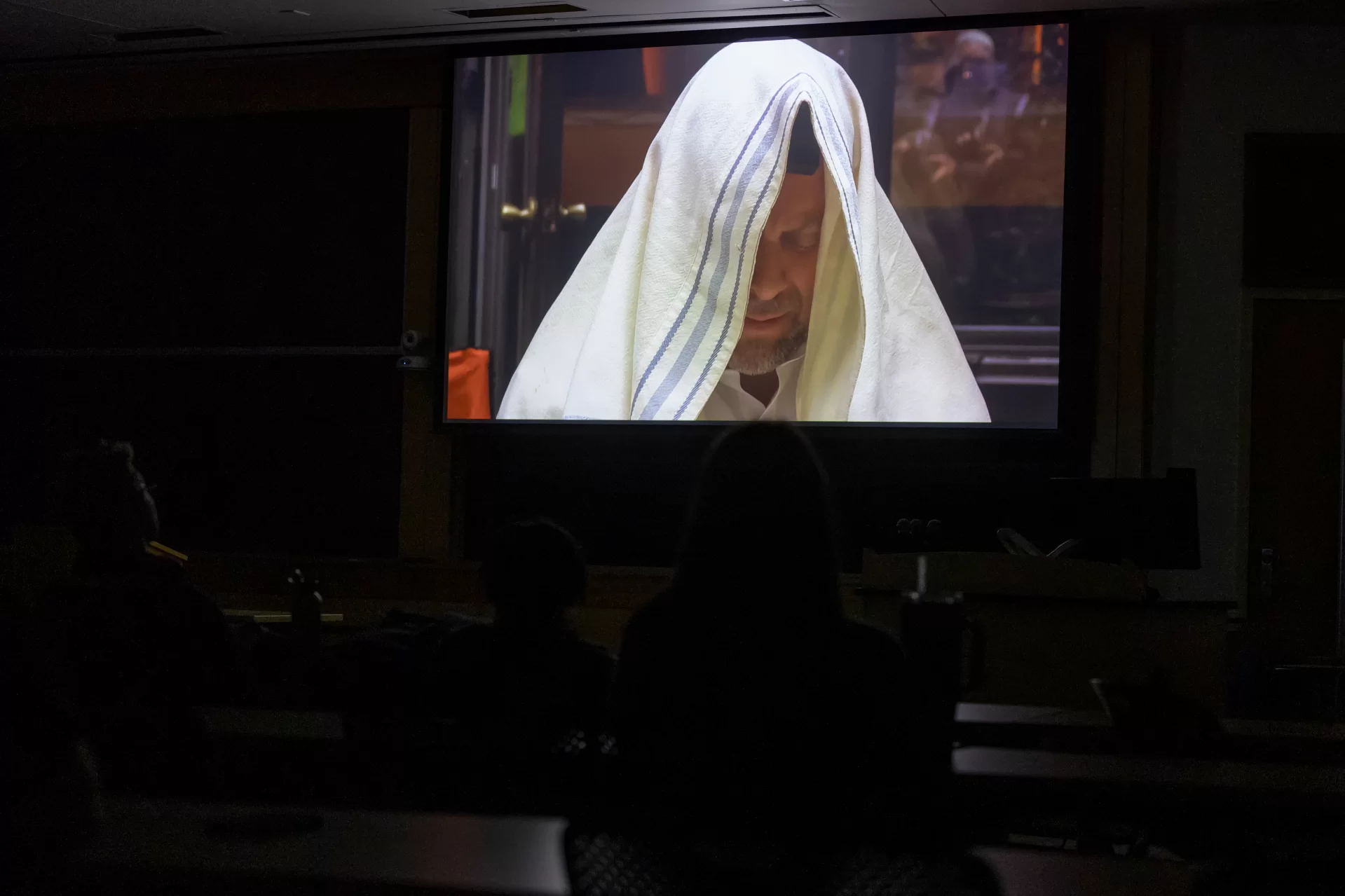 Filmmaker Sandi DuBowski screen his film Sabbath Queens to members of the Bates community on Feb. 4, 2026 in the Keck Classroom of Pettengill Hall.

Associate Professor of Hispanic Studies Stephanie Pridgeon introduced the film and launched a conversation with the filmmaker that included a Q&A with audience members, who included members of the Religion Department Cynthia Baker, Alison Melnick, and Halla Attallah.

SABBATH QUEEN, a feature documentary filmed over 21 years, follows Rabbi Amichai Lau-Lavie’s epic journey as the dynastic heir of 38 generations of Orthodox rabbis including the Chief Rabbis of Israel. He is torn between rejecting and embracing his destiny and becomes a drag-queen rebel, a queer bio-dad and the founder of Lab/Shul—an everybody-friendly, God-optional, artist-driven, pop-up experimental congregation.

SABBATH QUEEN joins Amichai on a lifelong quest to creatively and radically reinvent religion and ritual, challenge patriarchy and supremacy, champion interfaith love, and stand up for peace, ceasefire, and an end to the Occupation in Israel/Palestine. The film interrogates what Jewish survival means in a difficult rapidly changing 21st century.

SABBATH QUEEN is directed and produced by Sandi DuBowski
