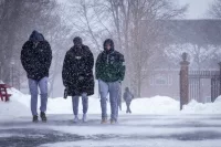 Over the woodlands brown and bare, over the harvest-fields forsaken, silent, and soft, and slow descends the snow. — Longfellow Back on campus after the February freak storm, Bates feels suspended between motion and stillness; cars crunch in half-melted tracks, boots drip by radiators, flights and plans still catching up somewhere in the clouds. Some of us are here, some are delayed, and the quiet holds space for both. It’s a strange return; rushed arrivals, late-night drives, weather maps open on our phones, yet the air itself feels calm, like the world pressed pause just long enough for us to notice it. The paradox is real; chaos in the forecast, steadiness on the quad. Snow does that. It softens edges, lowers voices, makes even a campus full of movement feel like it’s breathing slowly.