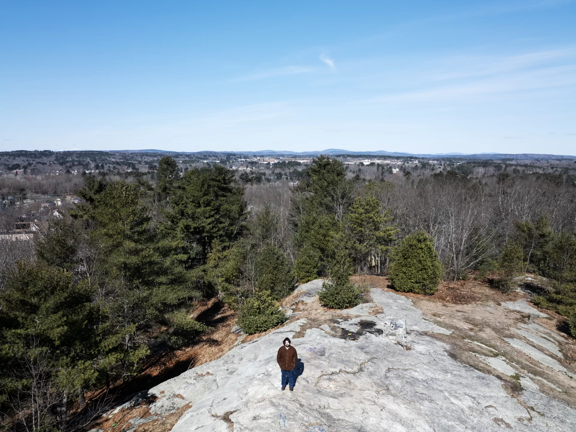 Brett Karpf ’26, of New York City, on top Mount David at Bates College on March 18, 2026. (Theophil Syslo | Bates College)