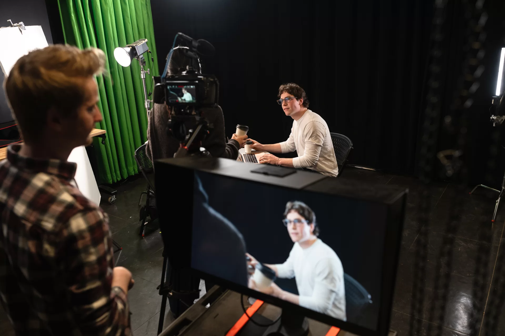 Lewiston, ME, United States -- Two students are filmed for an over-the-shoulder scene by the Digital Media Studios staff during an Acting and the Camera class taught by Professor Tim Dugan in Pettigrew at Bates College in Lewiston, ME on Tuesday, March 24, 2026. (Photo by Yoon S. Byun) © 2026 Strewn Wonder, LLC