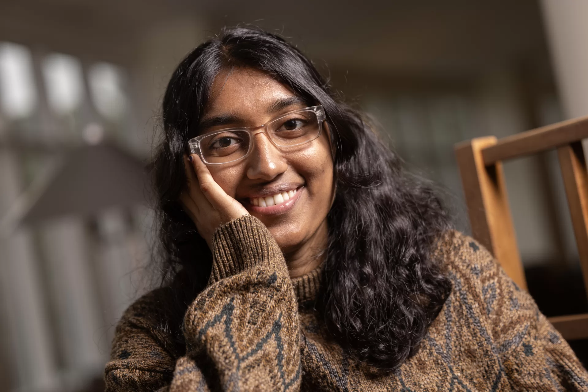 Vyshu Viju ’26 poses for a portrait in Pettengill Hall’s Perry Atrium. Davis grantee Vyshu Viju will head to India this summer for her project “Sustainable Cycles: Integrating Hygiene Equity and Waste Sovereignty in Chelannur,” which aims to improve access to menstrual waste disposal by installing trash incinerators specifically for menstrual waste. The town of Chelannur, where Viju’s grandparents live, is known for its excellent trash management system. However, menstrual product waste is excluded from regular trash pickup because of health safety concerns. Residents are instead expected to dispose of it at a site two hours away, but many residents burn their menstrual waste at home, Viju says, which causes pollution. “They’re supposed to collect [their menstrual waste] for two to three months and then throw it away,” Viju says. “But most people just find that to be a lot of work, and it just takes up too much of their time.” Viju and her grandparents will together work to secure government approval for the incinerators, then purchase and install them around Chelannur.