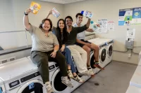 Students who were involved in securing free laundry washing for all Bates students, posing in the laundry room in Chu Hall on May 27, 2026.
Aleisha Martinez Sandoval ’26 of Mexico City, Trinity Monstwillo ’26 of Corvallis, Ore., Mohammad Zayd ;27 of the Bronx, N.Y., and Zachariah Richards ’26 of Princeton, Mass.