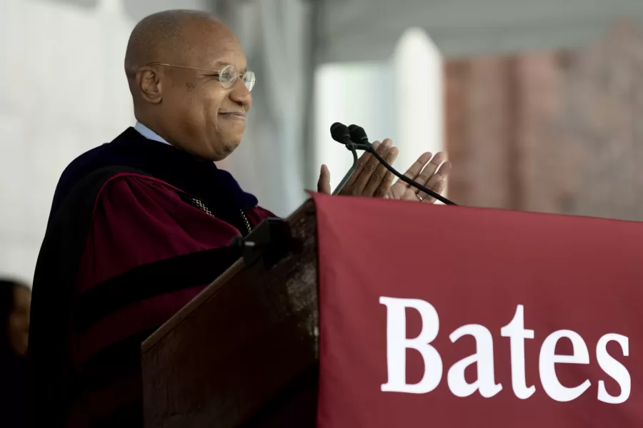 President Garry W. Jenkins cheers on the Class of 2026. "You all make my heart sing because whatever you do, I know you will do it with heart and humanity." (Phyllis Graber Jensen | Bates College)