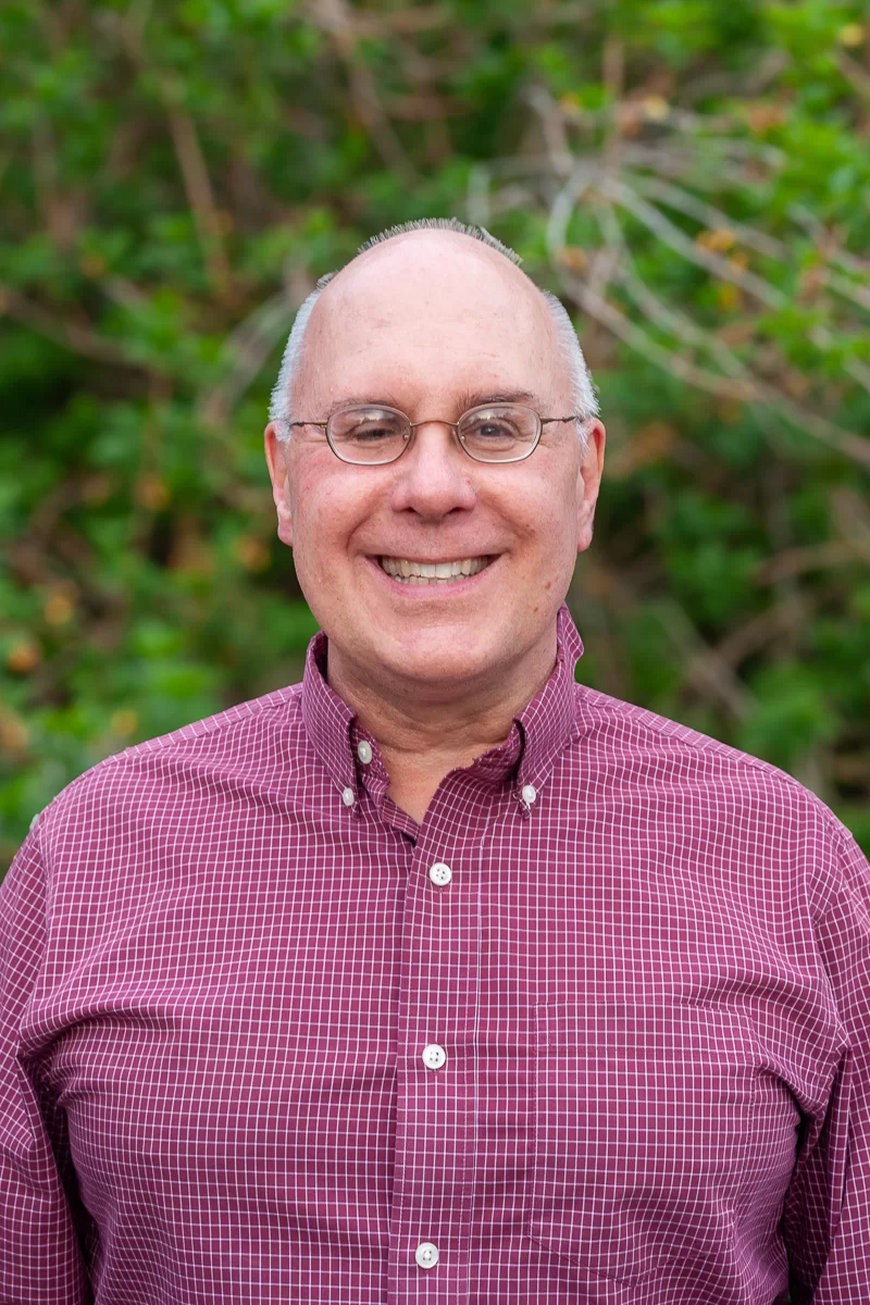 Headshot of a man outside
