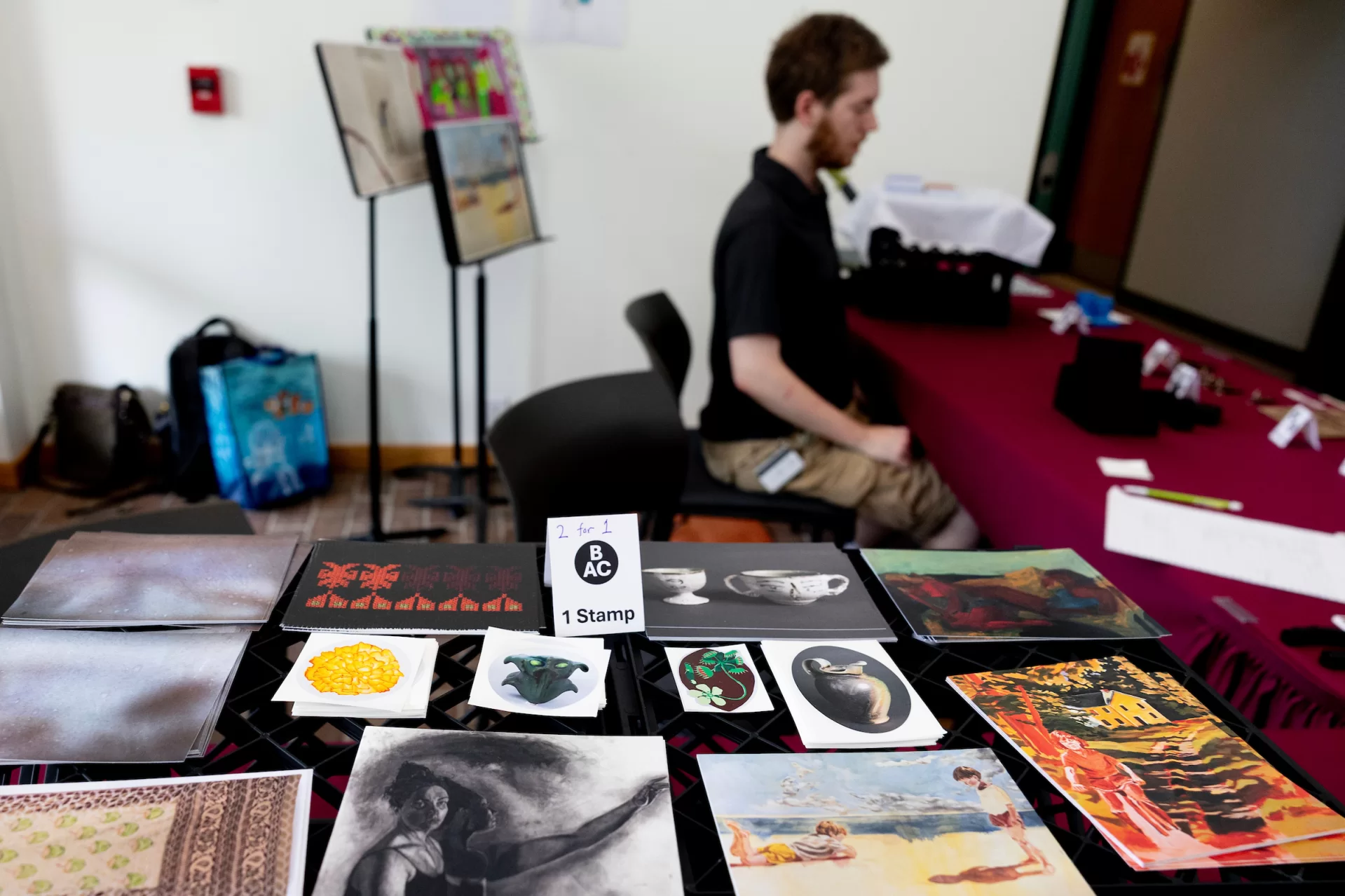 A display of posters and stickers for sale