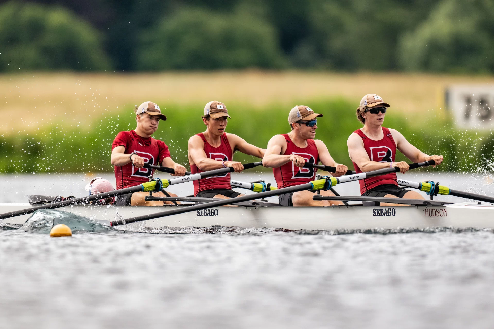 Five people rowing