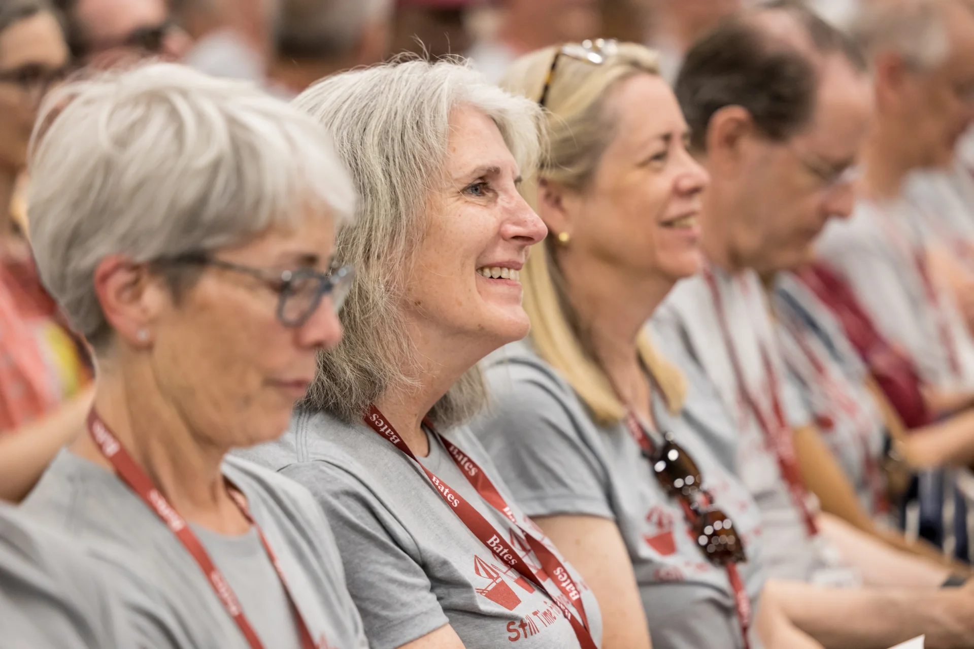 Audience members smiling