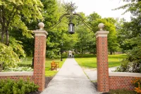 Ian del Rio Viera ‘29, of Bolivia, leads a tour around campus on July 21, 2026.(Theophil Syslo | Bates College)